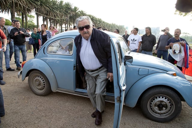 FILE - TO HOLD - Uruguay's former President Jose Mujica arrives to cast his vote in Montevideo, Uruguay, Oct. 26, 2014. (AP Photo/Natacha Pisarenko, File)