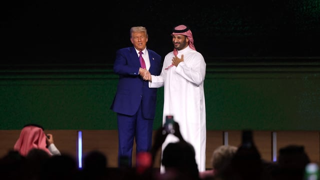 US President Donald Trump greets Saudi Crown Prince Mohammed bin Salman during the Saudi-US investment forum at the King Abdul Aziz International Conference Centre in Riyadh on May 13, 2025.
