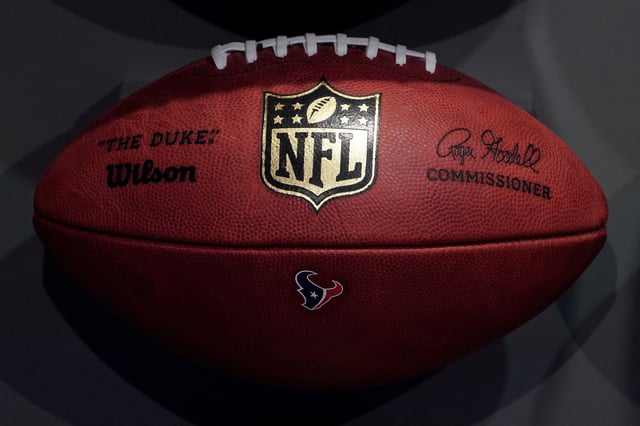 The NFL logo is pictured on a football at an event in the Manhattan borough of New York City, New York, U.S., November 30, 2017.  REUTERS/Carlo Allegri/File Photo