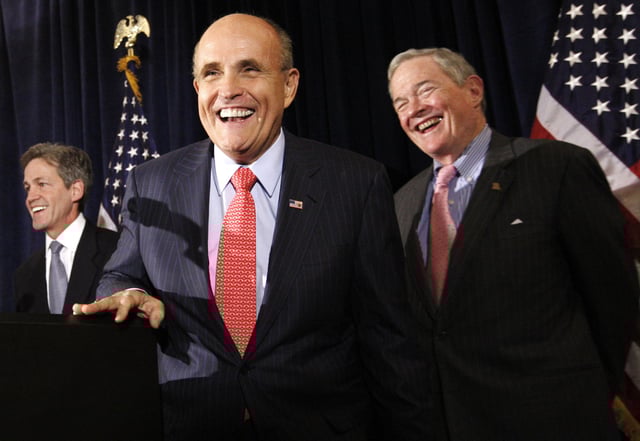 FILE 0Republican Presidential hopeful, former New York City Mayor Rudy Giuliani, center, laughs with Sen. Kit Bond, R-Mo., right, and Sen. Norm Coleman, R-Minn., during the announcement of Sen. Bond's endorsement of Giuliani for President, Friday, Nov. 2, 2007, in Washington. Sen. (AP Photo/Charles Dharapak, file)