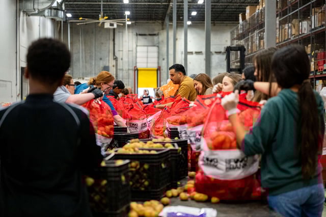 Youth volunteers package and organize food at the San Antonio Food Bank on March 27, 2025, in San Antonio, Texas.