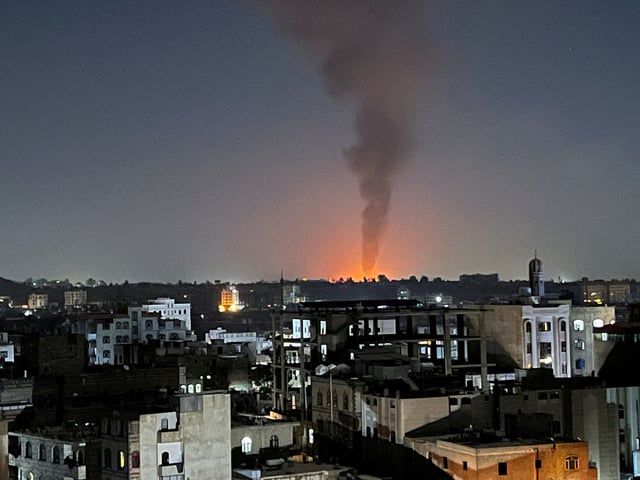 Smoke rises in the sky following U.S-led airstrikes in Sanaa, Yemen, February 25, 2024. REUTERS/Adel Al Khader/File Photo