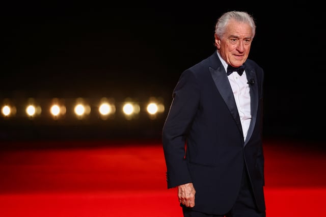 Robert De Niro arrives on stage during the opening ceremony and the screening the film "Partir un jour" (Leave One Day) Out of competition at the 78th Cannes Film Festival in Cannes, France, May 13, 2025. REUTERS/Sarah Meyssonnier