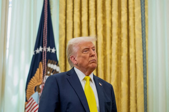 U.S. President Donald Trump listens to remarks during a swearing-in ceremony for Administrator of the Centers for Medicare and Medicaid Services Mehmet Oz in the Oval Office in Washington, D.C., U.S., April 18, 2025. REUTERS/Nathan Howard/File Photo