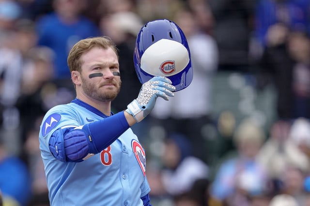 CHICAGO, ILLINOIS – APRIL 5: Ian Happ #8 of the Chicago Cubs receives a standing ovation in recognition of his 1000th career game in the bottom of the first inning in a game against the San Diego Padres at Wrigley Field on April 5, 2025 in Chicago, Illinois. (Photo by Matt Dirksen/Chicago Cubs/Getty Images)