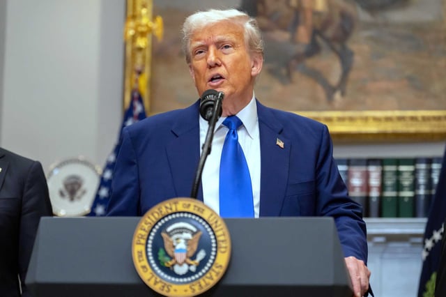President Donald Trump answers a reporter&#39;s question during an event in the Roosevelt Room at the White House, Monday.