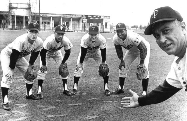 American baseball manager Sam Mele of the Minnesota Twins presents his new infield players at spring training, Orlando, Florida, March 1964 (from left): Rich Rollins, Zoilo Versailles, Bernie Allen, and Vic Power.