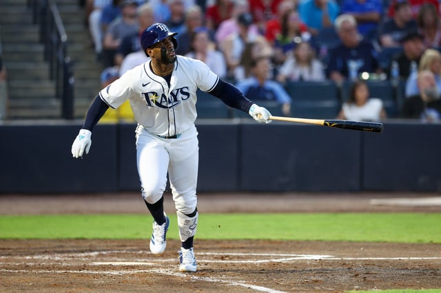 May 6, 2025; Tampa, Florida, USA; Tampa Bay Rays designated hitter Yandy Diaz (2) hits a two run home run against the Philadelphia Phillies in the fourth inning at George M. Steinbrenner Field. Mandatory Credit: Nathan Ray Seebeck-Imagn Images/File Photo