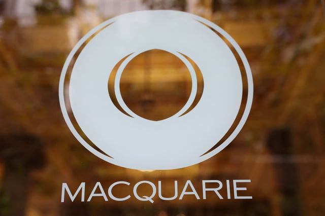 Macquarie Group logo is seen outside their headquarters in Sydney, Australia, May 9, 2025. REUTERS/Hollie Adams/File Photo