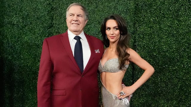 Bill Belichick and girlfriend Jordon Hudson pose on the red carpet at the NFL Honors award show ahead of Super Bowl LIX on Thursday, Feb. 6, 2025, in New Orleans.