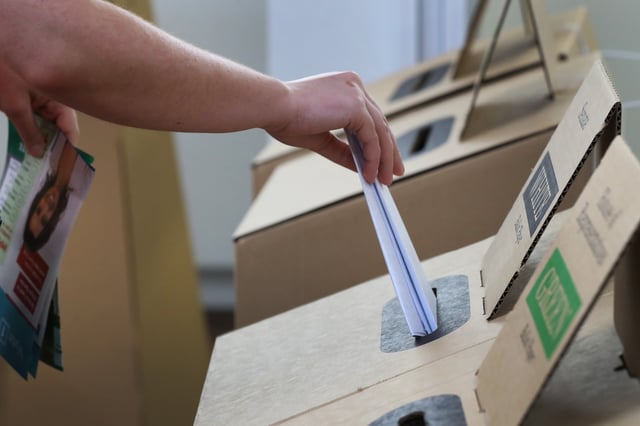 SYDNEY, AUSTRALIA - MAY 03: A person casts their vote at the Clovelly Surf Life Saving Club polling booth on May 03, 2025 in Sydney, Australia. Australians headed to the polls on Saturday for the 2025 federal election, where all 150 seats in the House of Representatives and 40 of 76 Senate seats are up for grabs. This election is especially consequential due to a tightly contested race, with cost-of-living pressures, affordable housing, and energy policy dominating the campaign. Though most polls indicate a narrow Labor victory against the Liberal-National coalition, the result could also lead to a hung parliament, reflecting the growing influence of independents and minor parties, and potentially reshaping the balance of power in Australia in the years ahead. (Photo by Lisa Maree Williams/Getty Images)