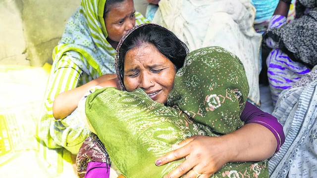 Relatives of one of the victims in Mardi Kalan village. (PTI)