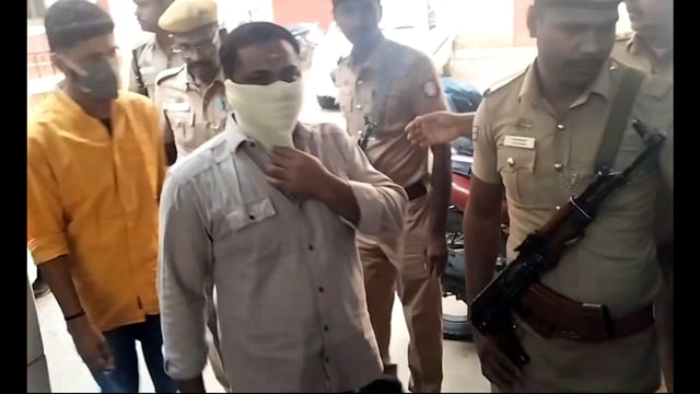 The accused being produced in a court in Coimbatore on Tuesday. (PTI)