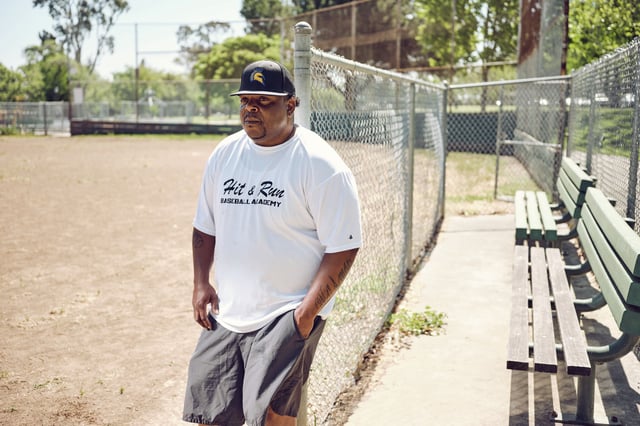 Pinole Valley High School baseball head coach T-Won Blake stands for a portrait at Terrace Park in Vallejo. He and another coach were reinstated after an investigation into slurs that were yelled at opposing players during a game.