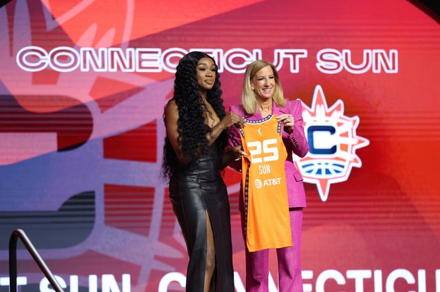 Apr 14, 2025; New York, New York, USA; Aneesah Morrow poses with WNBA commissioner Cathy Engelbert after being selected with the number seven overall pick to the Connecticut Sun in the 2025 WNBA Draft at The Shed at Hudson Yards. Mandatory Credit: Vincent Carchietta-Imagn Images/File Photo