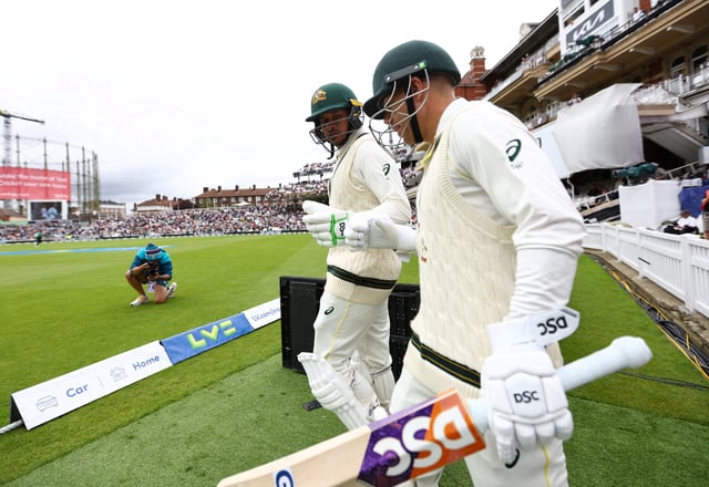 Cricket - Ashes - Fifth Test - England v Australia - The Oval, London, Britain - July 31, 2023 Australia's David Warner and Usman Khawaja take to the field for start of the day's play Action Images via Reuters/Andrew Boyers/File Photo