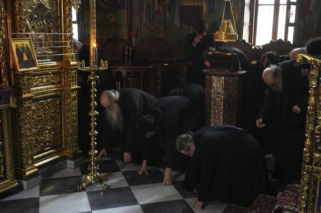 Monks attend afternoon prayers at Simonopetra, or the Simonos Petra Monastery, home of the all-male autonomous community Agion Oros, or Holy Mountain, on the peninsula of Mount Athos in northern Greece, Monday, April 14, 2025. (AP Photo/Thanassis Stavrakis)