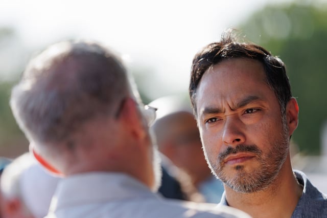 U.S. Representative Joaquín Castro speaks with the relatives of Navy veteran Mark Miller during a community vigil held outside the Audie L. Murphy Memorial Veterans Hospital in San Antonio on Wednesday, April 16, 2025. 