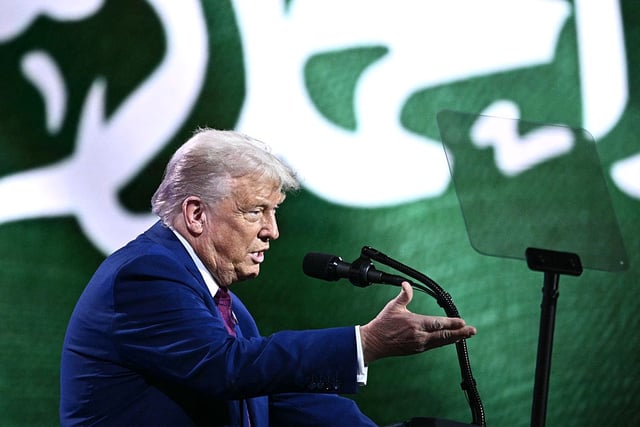 US President Donald Trump speaks during the Saudi-US investment forum at the King Abdul Aziz International Conference Center in Riyadh on May 13, 2025. Saudi Arabia on May 13 promised billions of dollars in deals with the United States from defence to artificial intelligence as it threw a lavish welcome for President Donald Trump on the first state visit of his second term. (Photo by Brendan SMIALOWSKI / AFP) (Photo by BRENDAN SMIALOWSKI/AFP via Getty Images)