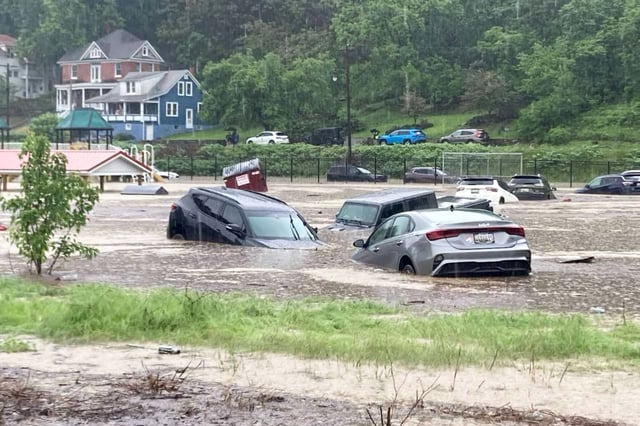 Cars in floodwaters in Westernport, Md., on Tuesday.
