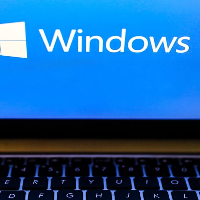 Windows 10 operating system logo is displayed on a laptop screen for illustration photo. Gliwice, Poland on January 23, 2022.
