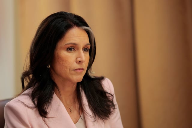 Director of National Intelligence Tulsi Gabbard listens during a Cabinet meeting at the White House on April 10 in Washington, DC.