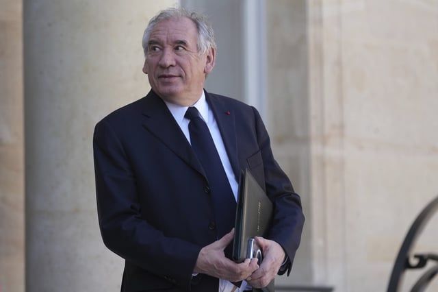 FILE - France's Prime Minister Francois Bayrou leaves the weekly cabinet meeting, Wednesday, March 19, 2025 at the Elysee Palace in Paris. (AP Photo/Thibault Camus, File)