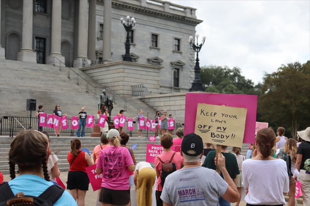 FILE - Protesters gather outside the state house in opposition to a proposed abortion ban debated Tuesday, Aug. 30, 2022 by the South Carolina House of Representatives in Columbia, S.C. (AP Photo/James Pollard, file)