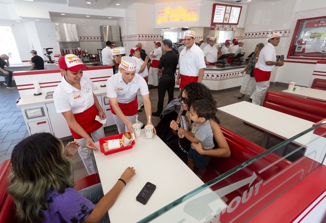 Customers are served during opening day of the In-N-Out Burger at The Outlets at Orange in Orange, CA on Friday, July 26, 2024.