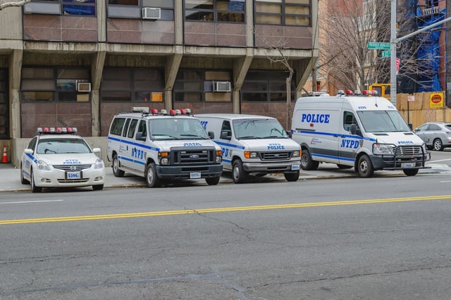 NYPD vehicles are parked in New York City.