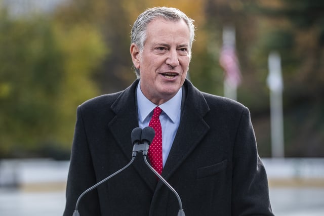 FILE - New York City Mayor Bill de Blasio speaks at the opening of New York's Wollman Rink in Central Park, Nov. 14, 2021. (AP Photo/Brittainy Newman, File)
