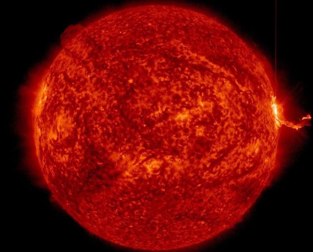 NASA’s Solar Dynamics Observatory captured this image of a solar flare – seen as the bright flash on the far right – on May 13, 2025.