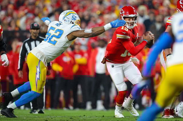 Khalil Mack #52 of the Los Angeles Chargers and Patrick Mahomes #15 of the Kansas City Chiefs during a game in Kansas City, Mo., on Dec. 8, 2024.