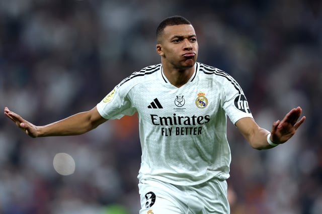 Kylian Mbappe of Real Madrid celebrates scoring his team&#39;s first goal during the Spanish Super Cup Final between Real Madrid and FC Barcelona at King Abdullah Sports City on January 12, 2025 in Jeddah, Saudi Arabia.