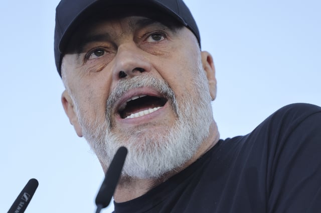 Albanian Prime Minister Edi Rama speaks to supporters during a celebratory rally for his Socialist Party victory in the last parliamentary elections, in Tirana, Albania, Wednesday, May 14, 2025. (AP Photo/Vlasov Sulaj)