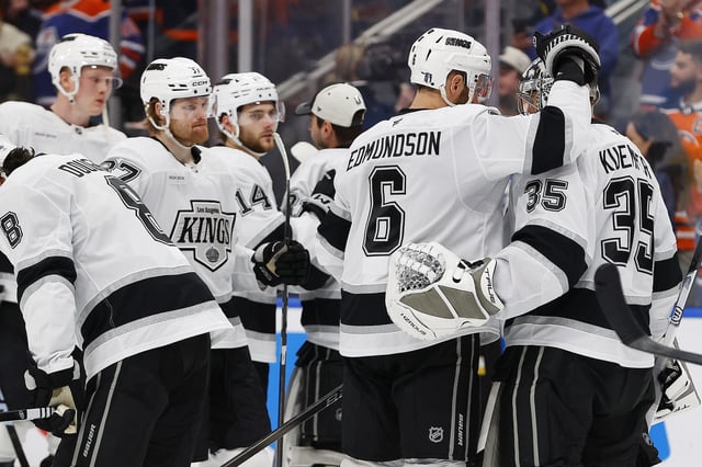 May 1, 2025; Edmonton, Alberta, CAN;The Los Angeles Kings console Los Angeles Kings goaltender Darcy Kuemper (35) after the Edmonton Oilers eliminated them  in game six of the first round of the 2025 Stanley Cup Playoffs at Rogers Place. Mandatory Credit: Perry Nelson-Imagn Images/File Photo