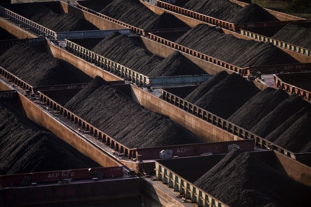 Coal on barges on the Monongahela River in Clairton, Penn., on Sept. 9, 2024. 