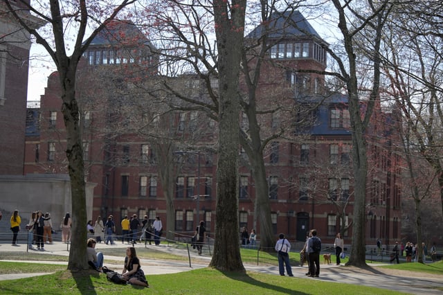 Students gather on the campus of Harvard University in Cambridge, Massachusetts, U.S., April 15, 2025.   REUTERS/Faith Ninivaggi/File Photo