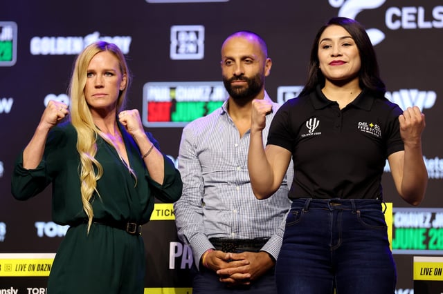 LOS ANGELES, CALIFORNIA - MAY 14: Holly Holm and Yolanda Vega face offduring a press conference at The Avalon on May 14, 2025 in Los Angeles, California.