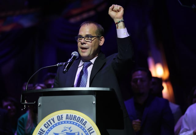 John Laesch speaks after being sworn in as the new mayor of Aurora during a ceremony at the Paramount Theatre on May 13, 2025.  (Chris Sweda/Chicago Tribune)