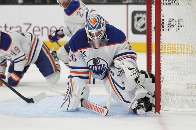Edmonton Oilers goaltender Calvin Pickard (30) makes a save against the Vegas Golden Knights during the second period of Game 2 of a second-round NHL hockey playoff series Thursday, May 8, 2025, in Las Vegas.