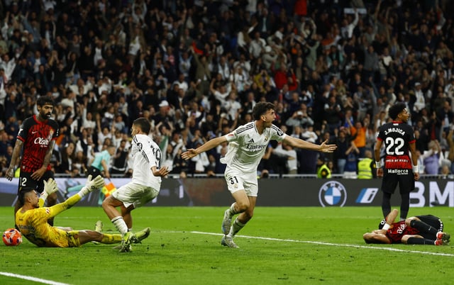 Soccer Football - LaLiga - Real Madrid v RCD Mallorca - Santiago Bernabeu, Madrid, Spain - May 14, 2025 Real Madrid's Jacobo Ramon celebrates scoring their second goal REUTERS/Susana Vera