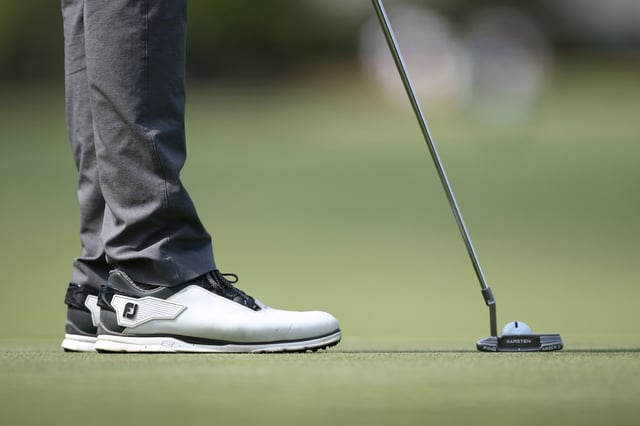 HILTON HEAD ISLAND, SOUTH CAROLINA - APRIL 18: A detailed view of shoes worn by Sahith Theegala of the United States on the fifth green during the second round of the RBC Heritage 2025 at Harbour Town Golf Links on April 18, 2025 in Hilton Head Island, South Carolina. (Photo by Jared C. Tilton/Getty Images)
