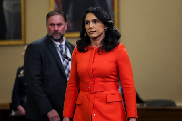 Director of National Intelligence (DNI) Tulsi Gabbard walks on the day she testifies at a House Intelligence Committee hearing about worldwide threats, on Capitol Hill in Washington, D.C., U.S., March 26, 2025. REUTERS/Leah Millis/File Photo