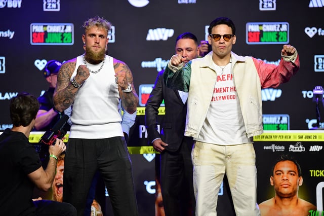 May 14, 2025; Los Angeles, California, USA; Jake Paul and Julio Cesar Chavez Jr. pose for photos following their press conference at Avalon Hollywood Theater. Mandatory Credit: Gary A. Vasquez-Imagn Images