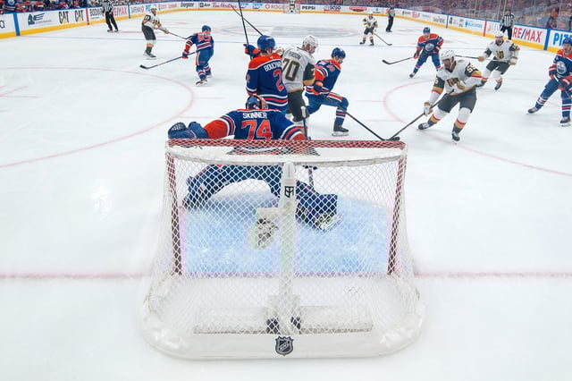 Stuart Skinner #74 of the Edmonton Oilers makes a save against Keegan Kolesar #55 of the Vegas Golden Knights in the first period of Game Three of the Second Round of the 2025 Stanley Cup Playoffs at Rogers Place on May 10, 2025, in Edmonton, Alberta, Canada.