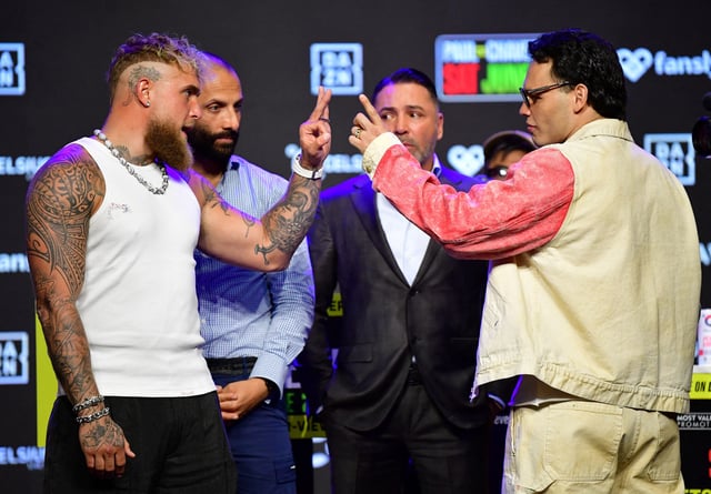 May 14, 2025; Los Angeles, California, USA; Jake Paul and Julio Cesar Chavez Jr. pose for photos in anticipation of their fight at Avalon Hollywood Theater. Mandatory Credit: Gary A. Vasquez-Imagn Images