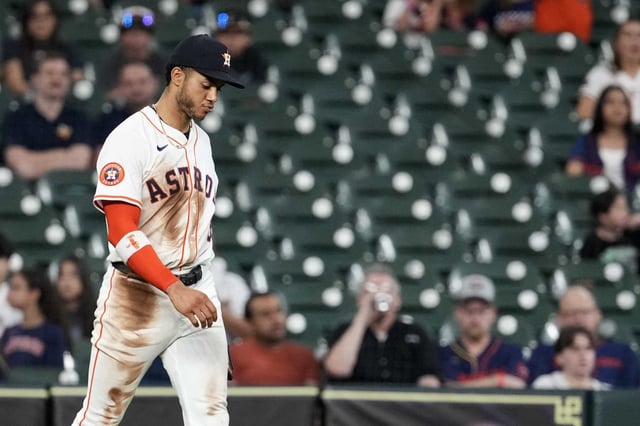 Houston Astros shortstop Jeremy Peña (3) reacts after his throw to first baseman Christian Walker to get out Kansas City Royals Drew Waters is wide in the second inning of an MLB baseball game at Daikin Park in Houston, Wednesday, May 14, 2025.