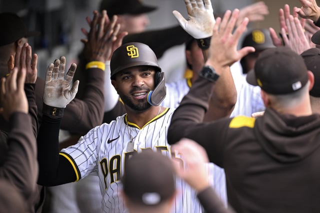 SAN DIEGO, CALIFORNIA – MAY 14: Xander Bogaerts #2 of the San Diego Padres is congratulated in the dugout after hitting a three-run home run against the Los Angeles Angels during the first inning at Petco Park on May 14, 2025 in San Diego, California. (Photo by Orlando Ramirez/Getty Images)