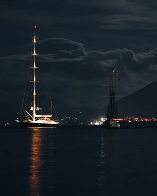 The Bayesian yacht (left), which capsized and sunk off the coast of Sicily in bad weather (Photo: Fabio La Bianca/PA Wire)